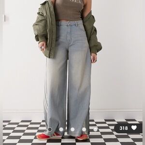 adidas Originals Adilenium Season 3 side zip jeans in light wash denim.